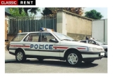 Louer une Voiture de police  - Blanc de 1990