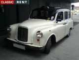 TAXI Anglais Londonien - Carbodies - 1991 - Blanc