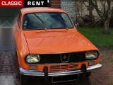 Louer une RENAULT R12 Orange de 1971